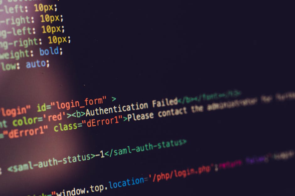 A close-up view of a computer screen displaying a web development code editor with lines of HTML and CSS code. The code features elements such as error messages highlighted in red, including 'Authenti